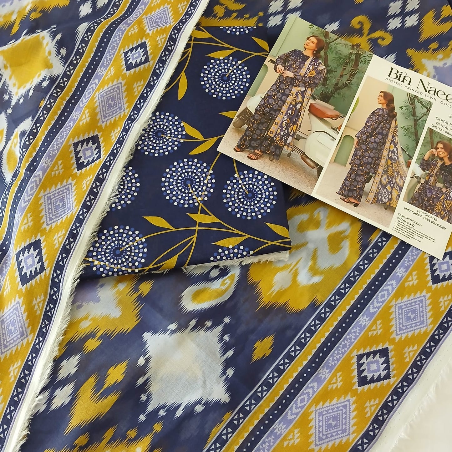 Complete 3 piece unstitched lawn suit set including shirt, trouser and dupatta