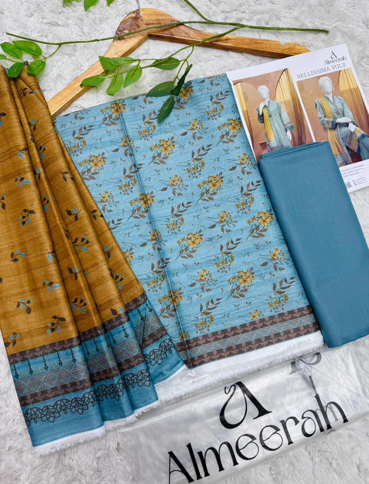 Almeera Bellissima Vol 2 unstitched printed lawn 3 piece suit in sky blue with mustard dupatta and dyed trouser available at Aladeen Fabrics