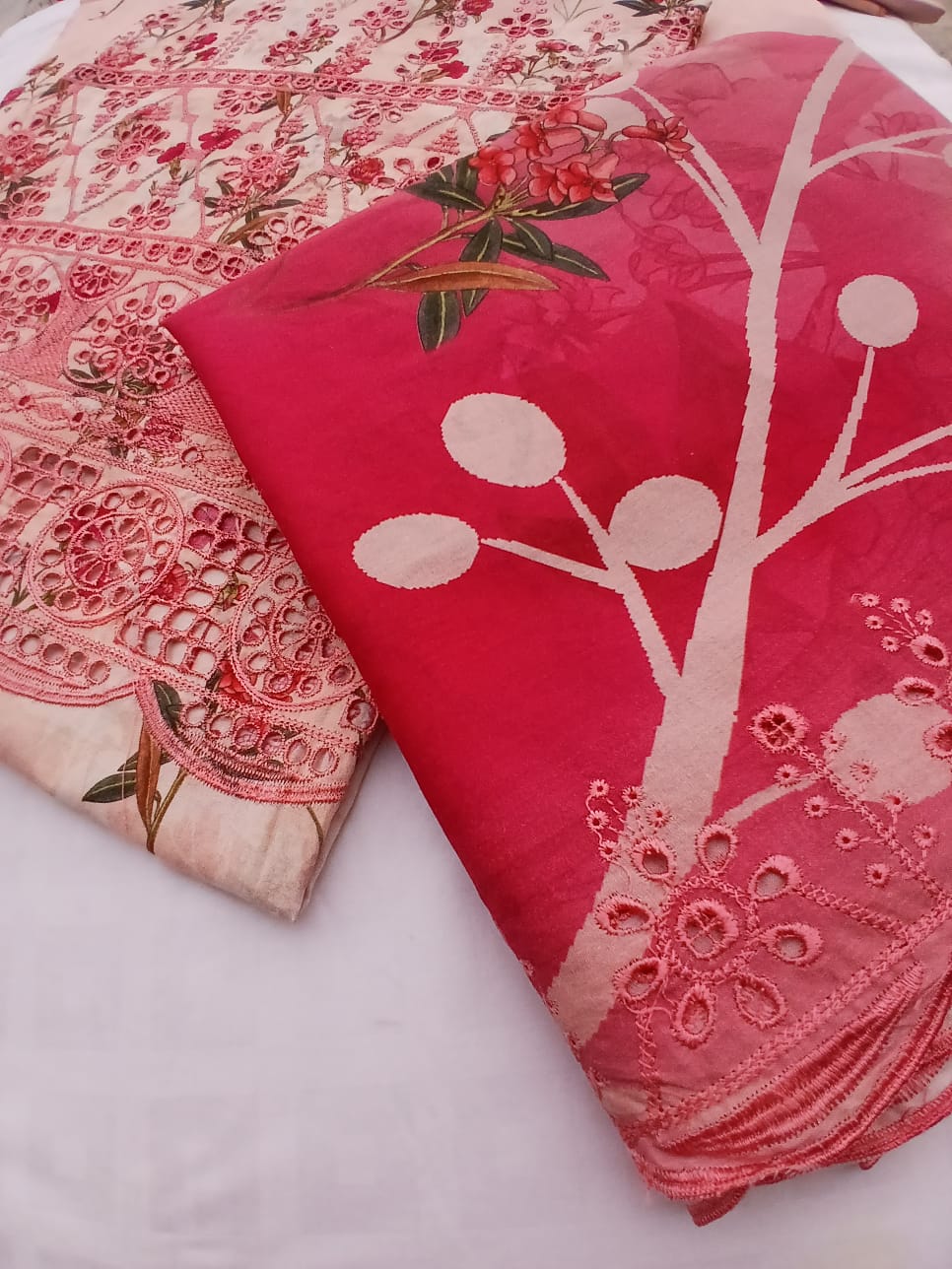 Back view of luxury pink embroidered lawn suit with elegant stitching and breathable summer lawn fabric finish