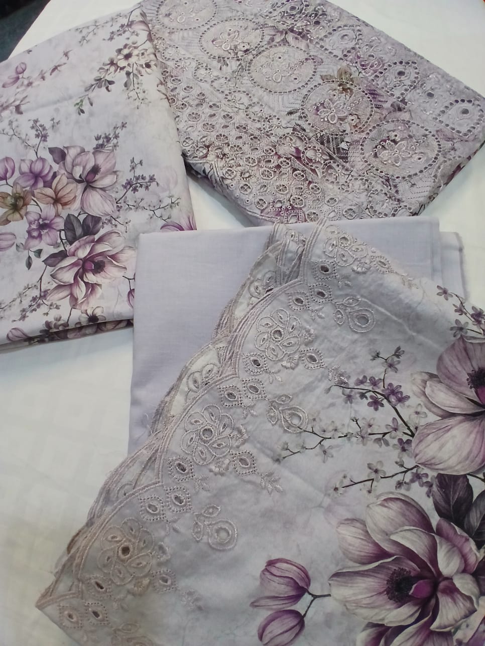 Detailed embroidery and cutwork design on premium lavender lawn fabric shirt
