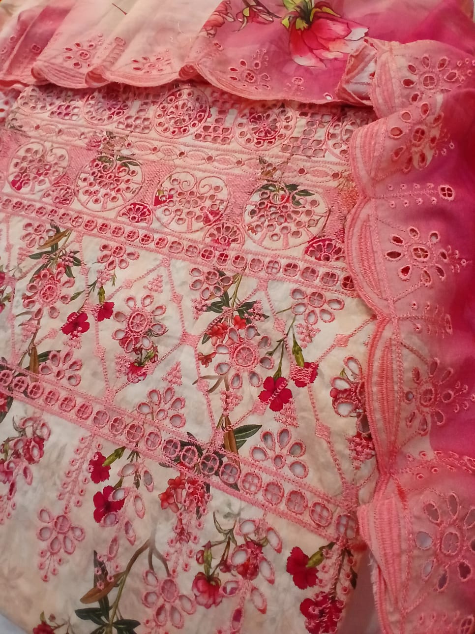 Soft pastel pink lawn dupatta with deep pink cutwork embroidered borders showcasing premium summer craftsmanship