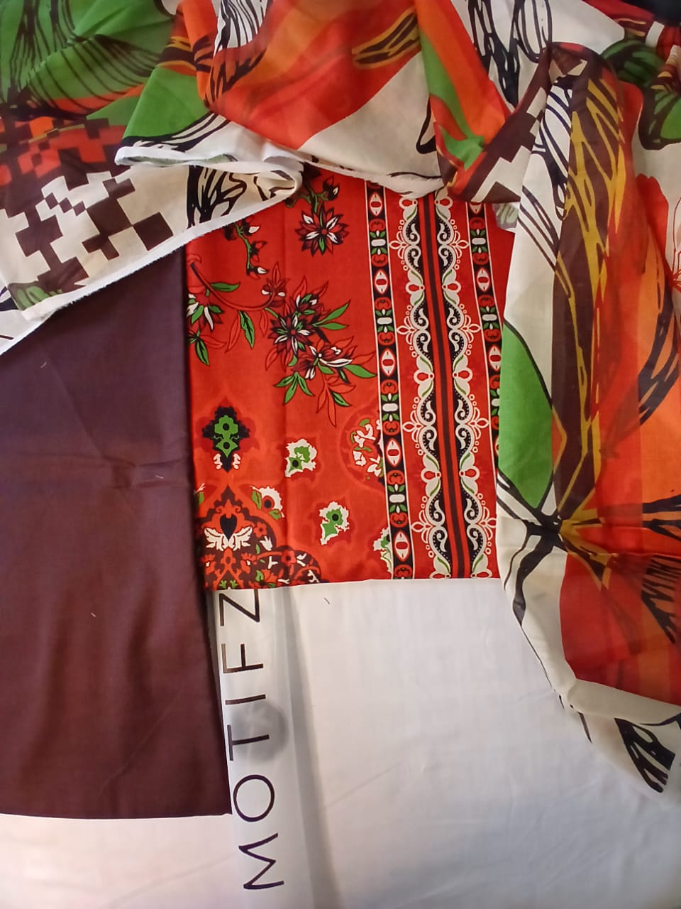 Motifz Zohra 3 Piece Lawn Printed Suit – Summer Dress | Unstitched Lawn Suit Pakistan | Aladeen Fabrics