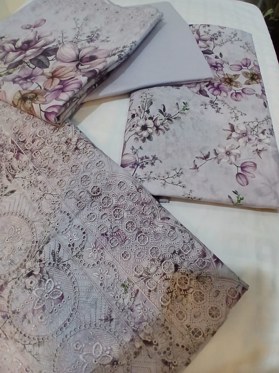 Complete three piece lavender embroidered lawn suit with digital printed dupatta and cambric trousers