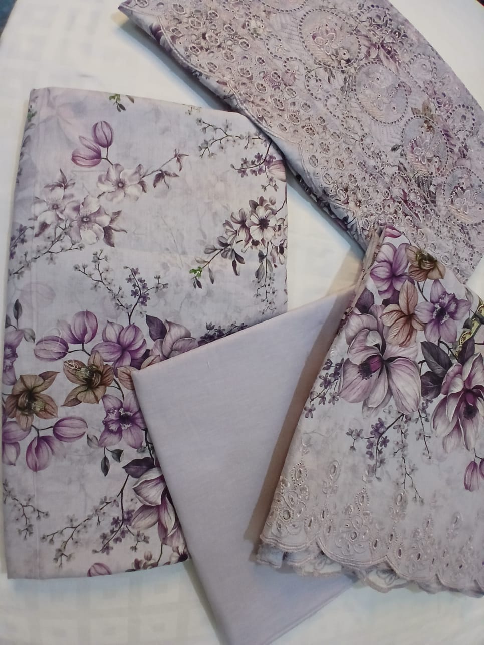 Lavender embroidered lawn suit with full front embroidery and cutwork detailing premium summer outfit