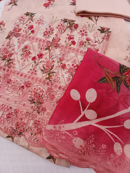 Luxury pink embroidered lawn suit front view featuring floral embroidery and elegant summer design by Aladeen Fabrics
