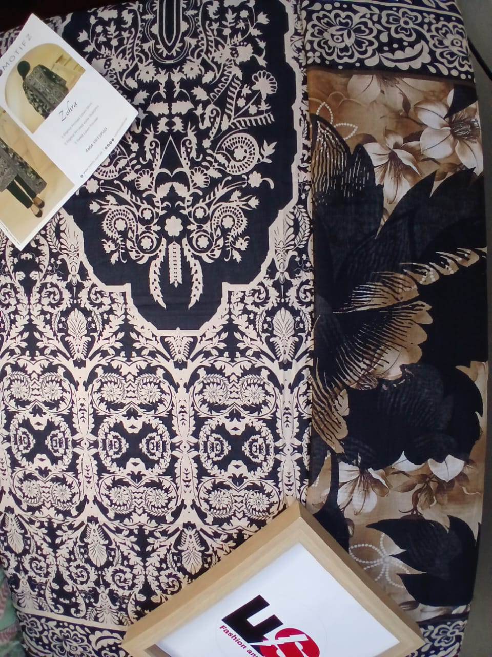 Close up fabric detail of black and beige lawn shirt digital print suit