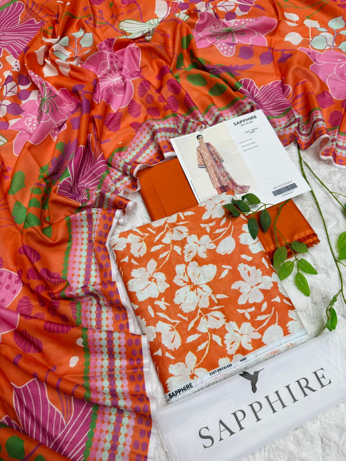 sapphire orange floral lawn suit 3 piece front view summer collection