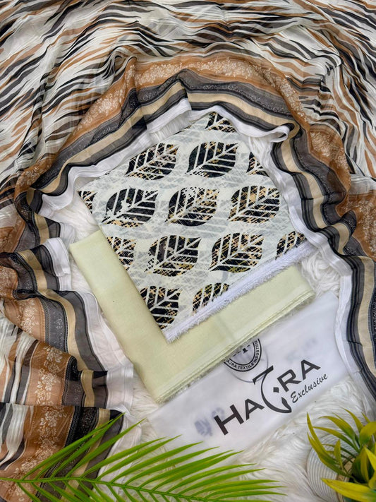 Aladeen Fabrics Hajra Exclusive off white printed lawn suit with golden brown and black floral design and chiffon dupatta