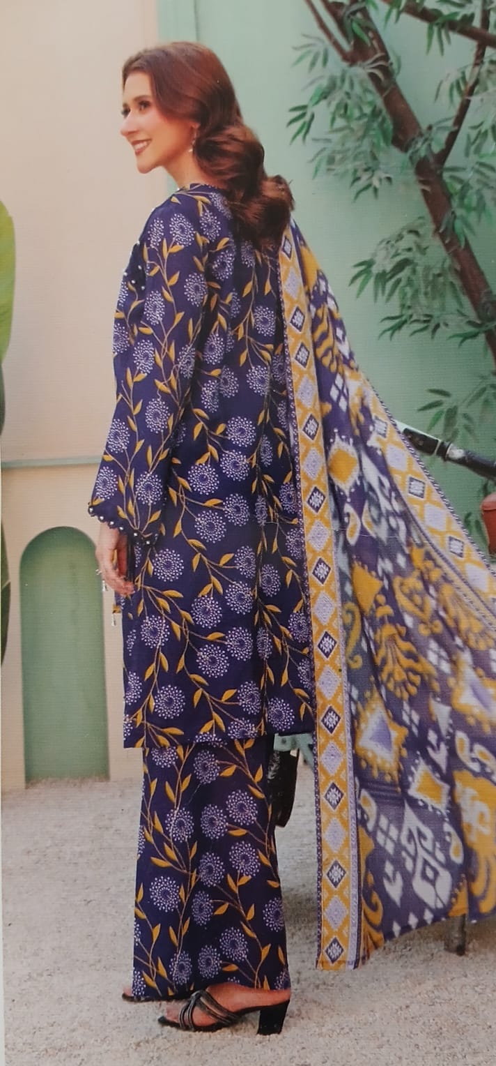 Elegant summer fashion look showing blue lawn suit style inspiration