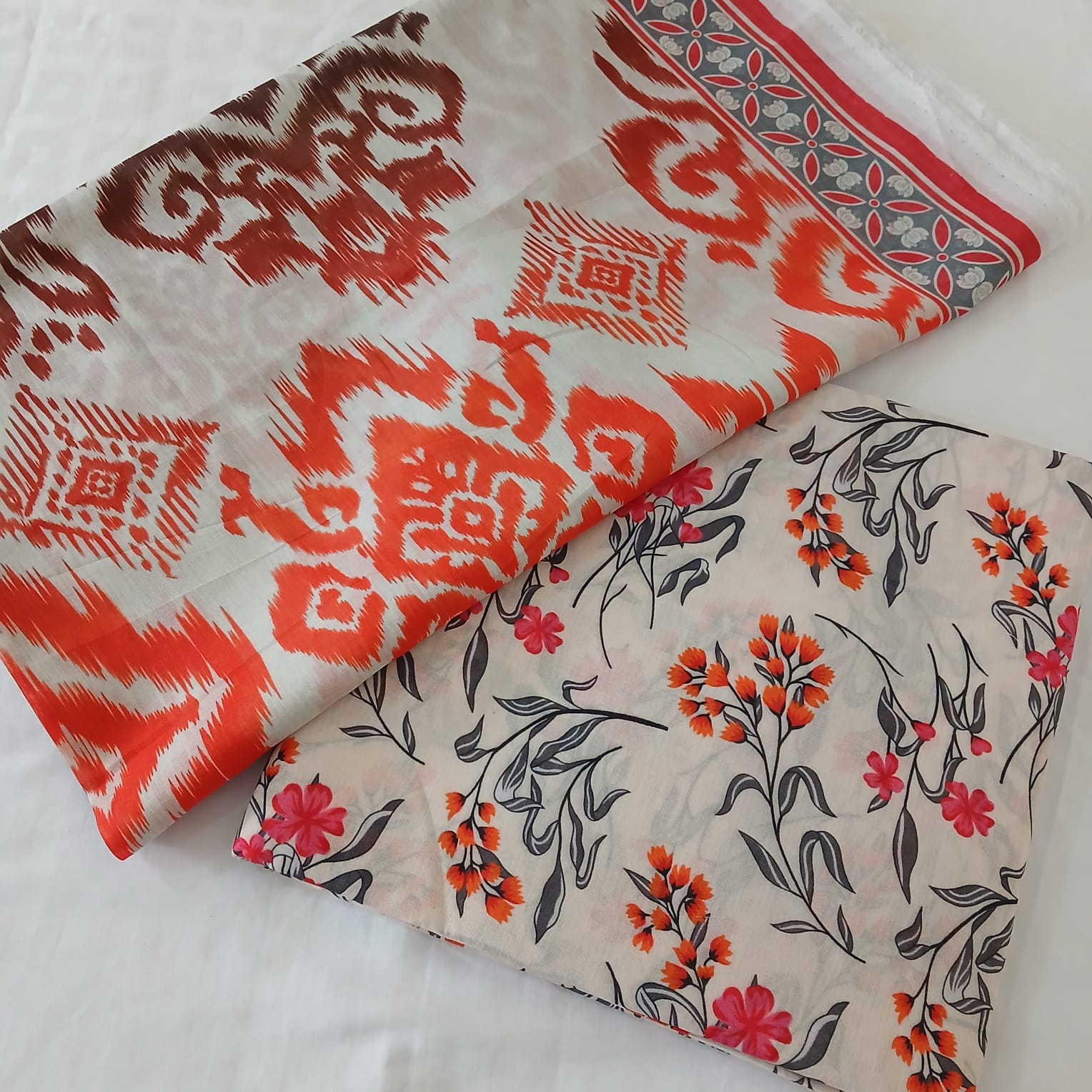 Women digital printed lawn suit complete set with shirt shalwar and dupatta laid out