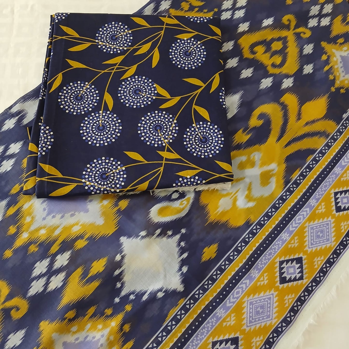 Close up detail of premium breathable lawn fabric with digital printed pattern